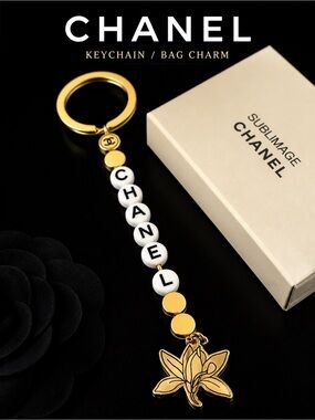 Chanel Gold &  White Keychain for Sublimage VIP Clients. Gold & Ivory. NIB.